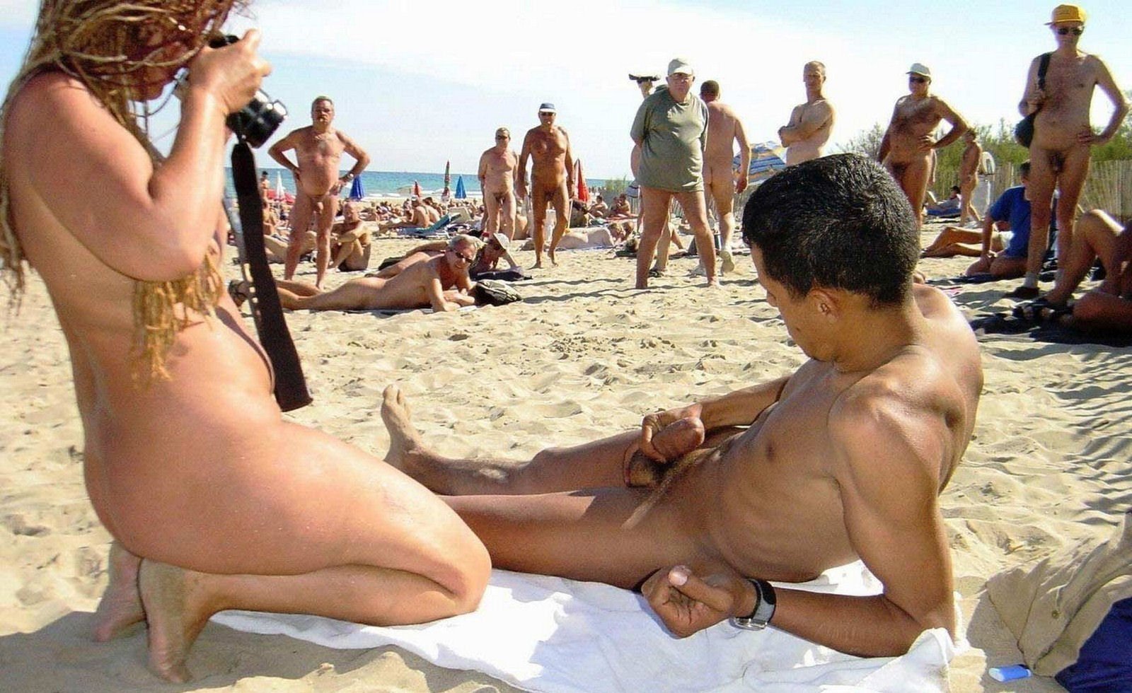 Nudist shaved handjob dick on beach